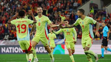 España ganó con once y con diez