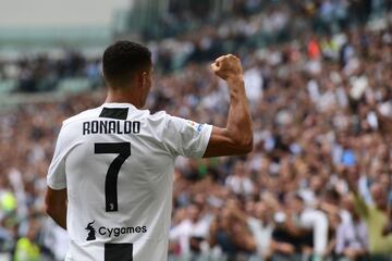 Juventus' Portuguese forward Cristiano Ronaldo celebrates after scoring his second goal during the Italian Serie A football match Juventus vs Sassuolo on September 16, 2018 at the Juventus stadium in Turin.