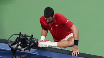 Tennis - ATP Masters 1000 - Shanghai Masters - Qizhong Forest Sports City Arena, Shanghai, China - October 11, 2025 Serbia's Novak Djokovic stretches during his semi final match against Monaco's Valentin Vacherot REUTERS/Go Nakamura