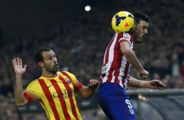 Mascherano con David Villa.