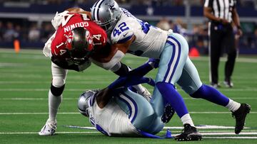 ARLINGTON, TEXAS - SEPTEMBER 11: Anthony Barr #42 of the Dallas Cowboys tackles Chris Godwin #14 of the Tampa Bay Buccaneers during the first half at AT&T Stadium on September 11, 2022 in Arlington, Texas.   Richard Rodriguez/Getty Images/AFP