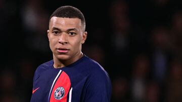 Paris Saint-Germain's French forward #07 Kylian Mbappe reacts during the UEFA Champions League quarter final first leg football match between Paris Saint-Germain (PSG) and FC Barcelona at the Parc des Princes stadium in Paris on April 10, 2024. (Photo by Miguel MEDINA / AFP)