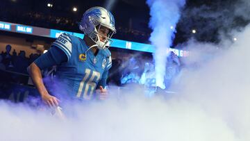 DETROIT, MICHIGAN - DECEMBER 16: Jared Goff #16 of the Detroit Lions runs onto the field prior to a game against the Denver Broncos at Ford Field on December 16, 2023 in Detroit, Michigan.   Gregory Shamus/Getty Images/AFP (Photo by Gregory Shamus / GETTY IMAGES NORTH AMERICA / Getty Images via AFP)