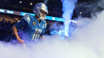 DETROIT, MICHIGAN - DECEMBER 16: Jared Goff #16 of the Detroit Lions runs onto the field prior to a game against the Denver Broncos at Ford Field on December 16, 2023 in Detroit, Michigan. Gregory Shamus/Getty Images/AFP (Photo by Gregory Shamus / GETTY IMAGES NORTH AMERICA / Getty Images via AFP)