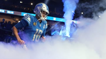 DETROIT, MICHIGAN - DECEMBER 16: Jared Goff #16 of the Detroit Lions runs onto the field prior to a game against the Denver Broncos at Ford Field on December 16, 2023 in Detroit, Michigan.   Gregory Shamus/Getty Images/AFP (Photo by Gregory Shamus / GETTY IMAGES NORTH AMERICA / Getty Images via AFP)