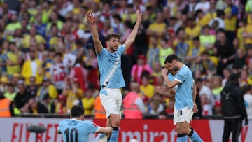 Manchester City's Spanish midfielder #14 Nico Gonzalez (C) celebrates with teammates on the pitch after the English FA Cup semi final football match between Manchester City and Southampton at Wembley stadium in London, on April 25, 2026. City won the game 2-1 (Photo by Adrian Dennis / AFP) / NOT FOR MARKETING OR ADVERTISING USE / RESTRICTED TO EDITORIAL USE