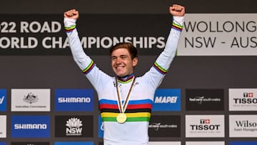 Belgian Remco Evenepoel celebrates on the podium with the gold medal and the rainbow jersey after winning the men's elite road race at the UCI Road World Championships Cycling 2022, in Wollongong, Australia, Sunday 25 September 2022. The Worlds are taking place from 18 to 25 September.
BELGA PHOTO DIRK WAEM (Photo by DIRK WAEM / BELGA MAG / Belga via AFP) (Photo by DIRK WAEM/BELGA MAG/AFP via Getty Images)