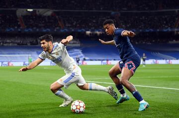 Marco Asensio y Presnel Kimpembe.