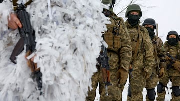 Members of the Siberian Battalion of the Ukraine's Armed Forces International Legion attend military exercises, amid Russia's attack on Ukraine, at an undisclosed location in Kyiv region, Ukraine December 13, 2023. REUTERS/Valentyn Ogirenko TPX IMAGES OF THE DAY
