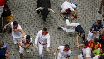 PAMPLONA, SPAIN - JULY 07: Revellers run with Puerto de San Lorenzo&#039;s fighting bulls before entering the bullring during the second day of the San Fermin Running of the Bulls festival on July 07, 2019 in Pamplona, Spain. The annual Fiesta de San Fermin, made famous by the 1926 novel of US writer Ernest Hemmingway entitled &#039;The Sun Also Rises&#039;, involves the daily running of the bulls through the historic heart of Pamplona to the bull ring. (Photo by Pablo Blazquez Dominguez/Getty Images)