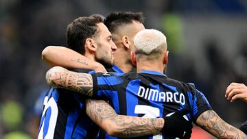 Soccer Football - Serie A - Inter Milan v Frosinone - San Siro, Milan, Italy - November 12, 2023 Inter Milan's Hakan Calhanoglu celebrates scoring their second goal with Lautaro Martinez and Federico Dimarco REUTERS/Daniele Mascolo