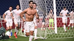 Spain&#039;s midfielder Marco Asensio (C) runs to celebrate after scoring the opening goal during the Tokyo 2020 Olympic Games men&#039;s semi-final football match between Japan and Spain at Saitama Stadium in Saitama on August 3, 2021. (Photo by Anne-Chr