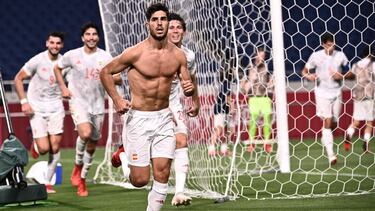 Spain's midfielder Marco Asensio (C) runs to celebrate after scoring the opening goal during the Tokyo 2020 Olympic Games men's semi-final football match between Japan and Spain at Saitama Stadium in Saitama on August 3, 2021. (Photo by Anne-Chr