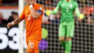 Los jugadores de Holanda se lamentan.