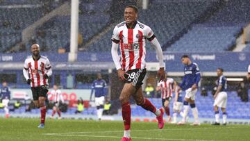 Sheffield United's Daniel Jebbison celebrates after scoring his side's opening goal during the English Premier League soccer match between Everton and Sheffield United at Goodison Park in Liverpool, England, Sunday, May 16, 2021. (Alex Pantling/