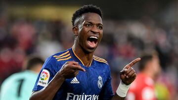 Real Madrid&#039;s Brazilian forward Vinicius Junior celebrates after scoring his team&#039;s third goal during the Spanish League football match between Granada FC and Real Madrid CF at Nuevo Los Carmenes stadium in Granada on November 21, 2021. (Photo by JORGE GUERRERO / AFP)