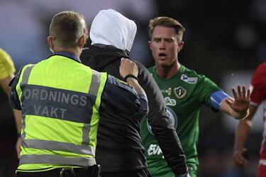 Match suspended after keeper is attacked by masked fan