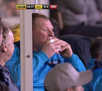 Sutton's sub goalie Wayne Shaw eating the pie in question