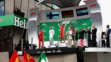 MONTREAL, QC - JUNE 10:  Top three finishers Sebastian Vettel of Germany and Ferrari, Valtteri Bottas of Finland and Mercedes GP and Max Verstappen of Netherlands and Red Bull Racing celebrate on the podium during the Canadian Formula One Grand Prix at Circuit Gilles Villeneuve on June 10, 2018 in Montreal, Canada.  (Photo by Will Taylor-Medhurst/Getty Images)