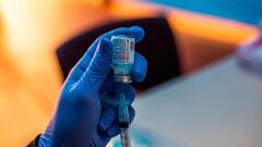 Medical workers load syringes with the Moderna Covid-19 vaccine to be administered by nurses at a vaccination site at Kedren Community Health Center, in South Central Los Angeles, California. 