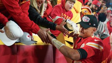 Dec 8, 2024; Kansas City, Missouri, USA; Kansas City Chiefs quarterback Patrick Mahomes (15) greets fans while leaving the field after the win over the Los Angeles Chargers at GEHA Field at Arrowhead Stadium. Mandatory Credit: Denny Medley-Imagn Images