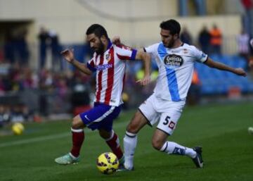 Arda Turan y Pablo Insua