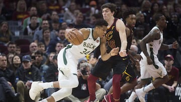 Dec 14, 2018; Cleveland, OH, USA; Milwaukee Bucks forward Giannis Antetokounmpo (34) drives to the basket against Cleveland Cavaliers forward Cedi Osman (16) during the first quarter at Quicken Loans Arena. Mandatory Credit: Ken Blaze-USA TODAY Sports