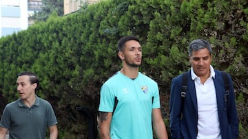 Nelson Monte, con su agente y Capote, del Málaga.