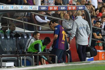 Messi heads down the tunnel and away for tests.