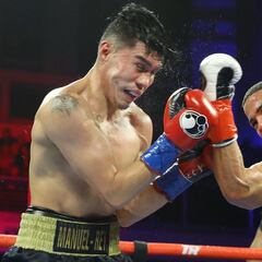 What is Masayoshi Nakatani's boxing record?