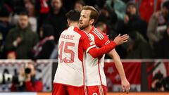 Munich (Germany), 24/02/2024.- Munich's Harry Kane (R) celebrates after scoring the 3-0 goal with Munich's Aleksandar Pavlovic during the UEFA Champions League round of sixteen second leg match between FC Bayern Munich and SS Lazio, in Munich, Germany, 05 March 2024. (Liga de Campeones, Alemania) EFE/EPA/ANNA SZILAGYI
