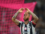 Monterrey's Spanish defender #93 Sergio Ramos celebrates after scoring the equalising goal from the penalty spot during the Liga MX Apertura football tournament match between Monterrey and Pumas at BBVA Stadium in Monterrey, Nuevo Leon state, Mexico on October 18, 2025. (Photo by Julio Cesar AGUILAR / AFP)