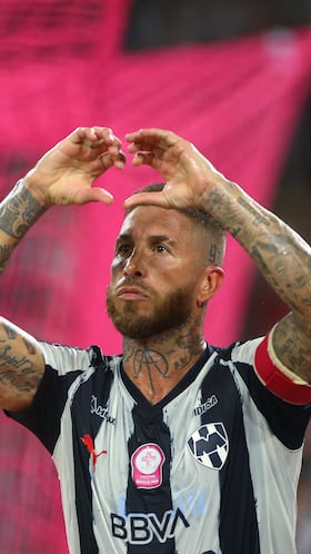 Monterrey's Spanish defender #93 Sergio Ramos celebrates after scoring the equalising goal from the penalty spot during the Liga MX Apertura football tournament match between Monterrey and Pumas at BBVA Stadium in Monterrey, Nuevo Leon state, Mexico on October 18, 2025. (Photo by Julio Cesar AGUILAR / AFP)