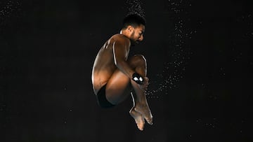 Colombia's Alejandro Solarte competes in the men's 10m platform diving preliminary during the Paris 2024 Olympic Games at the Aquatics Centre in Saint-Denis, north of Paris, on August 9, 2024. (Photo by Manan VATSYAYANA / AFP)