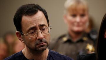 Larry Nassar, a former team USA Gymnastics doctor who pleaded guilty in November 2017 to sexual assault charges, stands during his sentencing hearing in Lansing, Michigan, U.S., January 24, 2018. REUTERS/Brendan McDermid