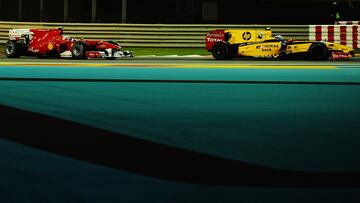 Alonso persigue al Renault de Petrov en Abu Dhabi 2010.