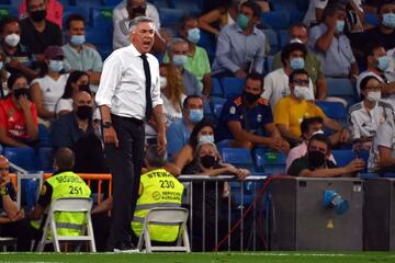 Real Madrid's Italian coach Carlo Ancelotti shouts from the sideline during the Spanish League football match between Real Madrid CF and RC Celta de Vigo at the Santiago Bernabeu stadium in Madrid on September 12, 2021. (Photo by GABRIEL BOUYS / AFP)