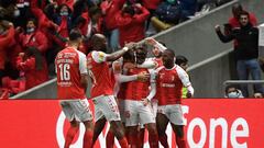 Sporting Braga&#039;s Portuguese midfielder Iuri Medeiros (C) celebrates with teammates after scoring a goal during the Portuguese League football match between SC Braga and SL Benfica at the Municipal stadium of Braga on April 1, 2022. (Photo by MIGUEL R