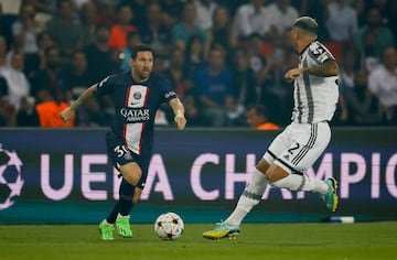 Lionel Messi y Leandro Paredes.