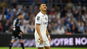 Marseille's Chilean forward Alexis Sanchez celebrates after scoring his team's second goal during the French L1 football match between Olympique Marseille (OM) and AJ Auxerre at Stade Velodrome in Marseille, southern France on April 30, 2023. (Photo by CLEMENT MAHOUDEAU / AFP)