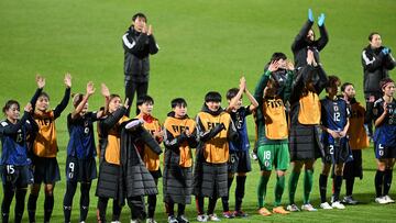 Players of Japan celebrate after winning the 2024 FIFA U-20 Women's World Cup round of 16 match between Japan and Nigeria at Metropolitano de Techo stadium in Bogota on September 12, 2024. (Photo by Raul ARBOLEDA / AFP)