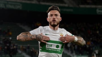 ELCHE, SPAIN - DECEMBER 05: Jose Antonio Ferrandez Pomares of Elche celebrates after scoring their side's third goal during the La Liga Santander match between Elche CF and Cadiz CF at Estadio Manuel Martinez Valero on December 05, 2021 in Elche, Spa