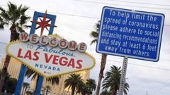 (FILES) In this file photo taken on March 22, 2020, a sign placed in front of the Welcome to Fabulous Las Vegas sign displays a message about social distancing due to the continuing spread of the coronavirus in Las Vegas, Nevada. - NBA officials are studying the possibility of staging the entire playoffs in Las Vegas but nothing is close to being settled, Sports Illustrated reported April 2, 2020. (Photo by Ethan Miller / GETTY IMAGES NORTH AMERICA / AFP)