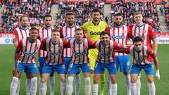 Girona players pose before the Spanish league football match between Girona FC and Valencia CF at the Montilivi stadium in Girona on December 1, 2023. (Photo by LLUIS GENE / AFP)