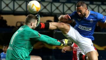 FILED - 18 March 2021, United Kingdom, Glasgow: Rangers&#039; Kemar Roofe collides with Slavia Prague&#039;s Ondrej Kolar during the UEFA Europa League round of 16 second leg soccer match between Rangers FC and SK Slavia Prague at Ibrox Stadium. Photo: An