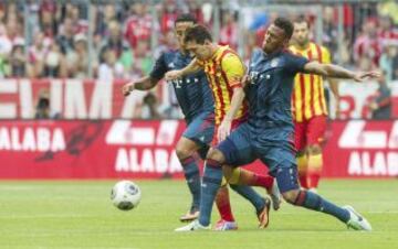 Messi entre Thiago y Jerome Boateng.