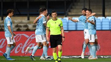 VIGO, SPAIN - APRIL 25: Iago Aspas of Celta Vigo celebrates with Nolito after scoring their side's first goal during the La Liga Santander match between RC Celta and C.A. Osasuna at Abanca-Bala¨ªdos on April 25, 2021 in Vigo, Spain. Sporting stadiums aroun