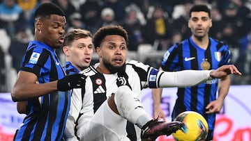 Juventus' US midfielder #16 Weston McKennie (R) fights for the ball with Inter Milan's Dutch defender #02 Denzel Dumfries during the Italian Serie A football match between Juventus and Inter Milan at the Juventus Stadium in Turin on February 16, 2025. (Photo by Isabella BONOTTO / AFP)