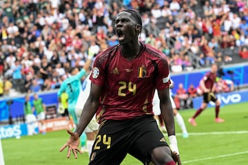 Belgium's midfielder #24 Amadou Onana celebrates his team's first goal, before it was ruled out after VAR review, during the UEFA Euro 2024 Group E football match between Belgium and Slovakia at the Frankfurt Arena in Frankfurt am Main on June 17, 2024. (Photo by THOMAS KIENZLE / AFP)