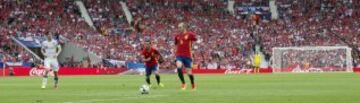 Iniesta brings the ball under his spell.